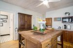 Fully equipped kitchen with center work island and snack bar